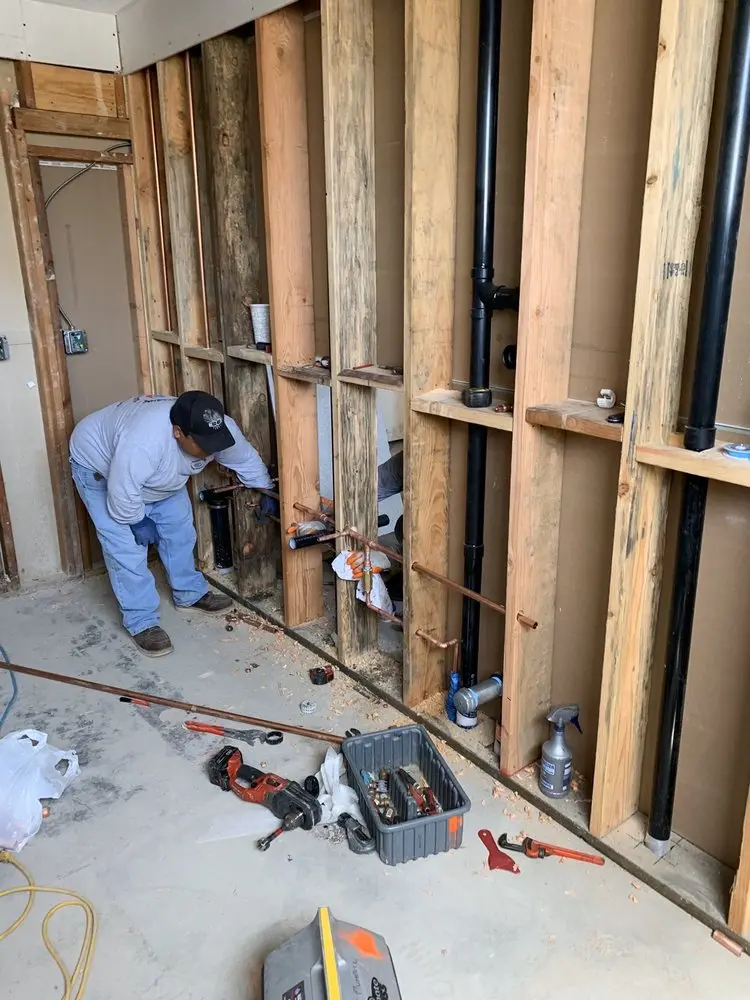 Commercial rough-in plumbing for Water Heater Replacement in Howland